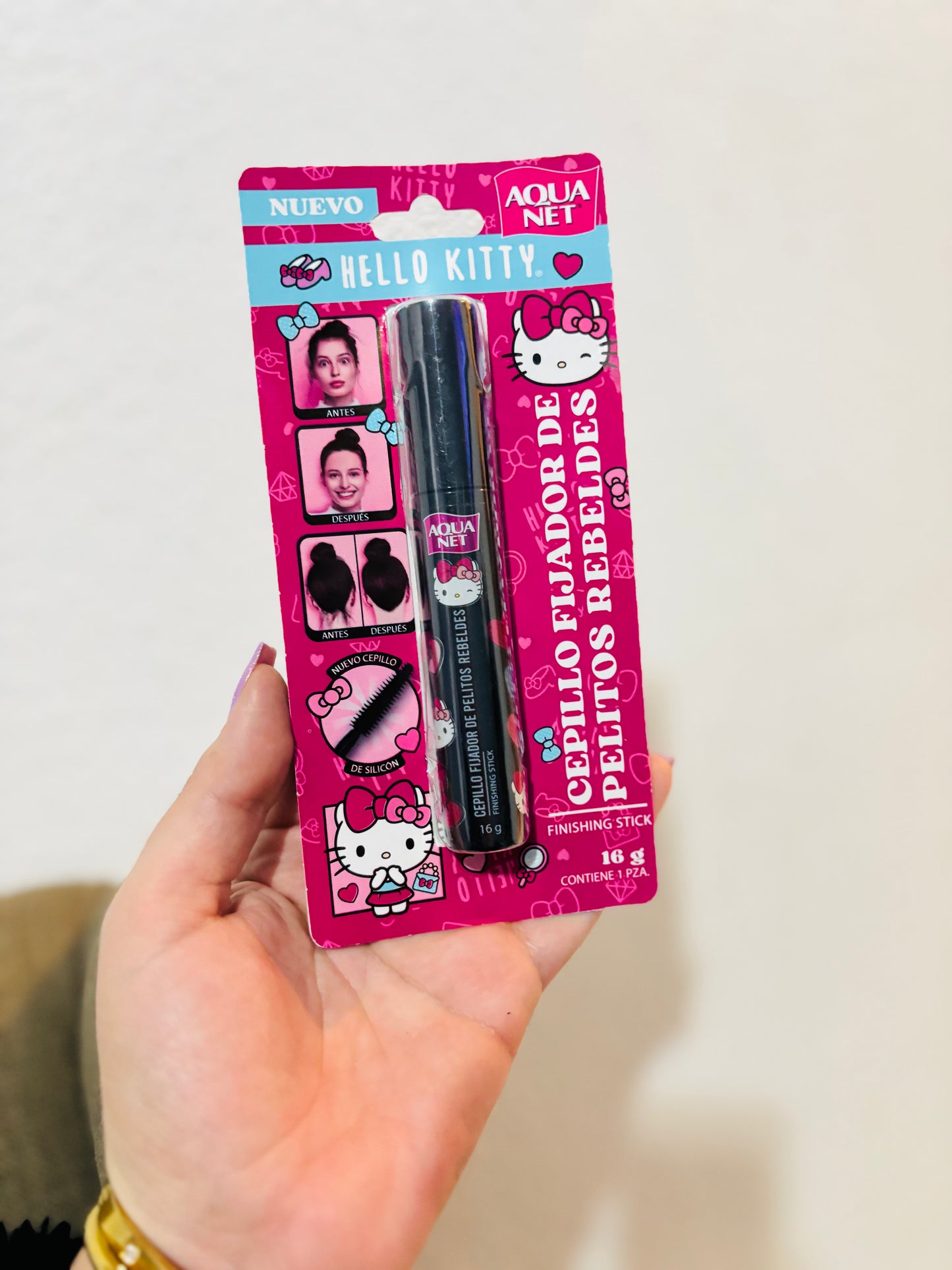 Cepillo fijador Aquanet “hello kitty”